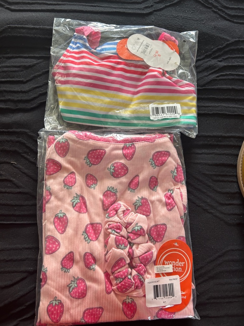 wonder nation Pink Strawberry Pajama Set and striped bathing suit.
